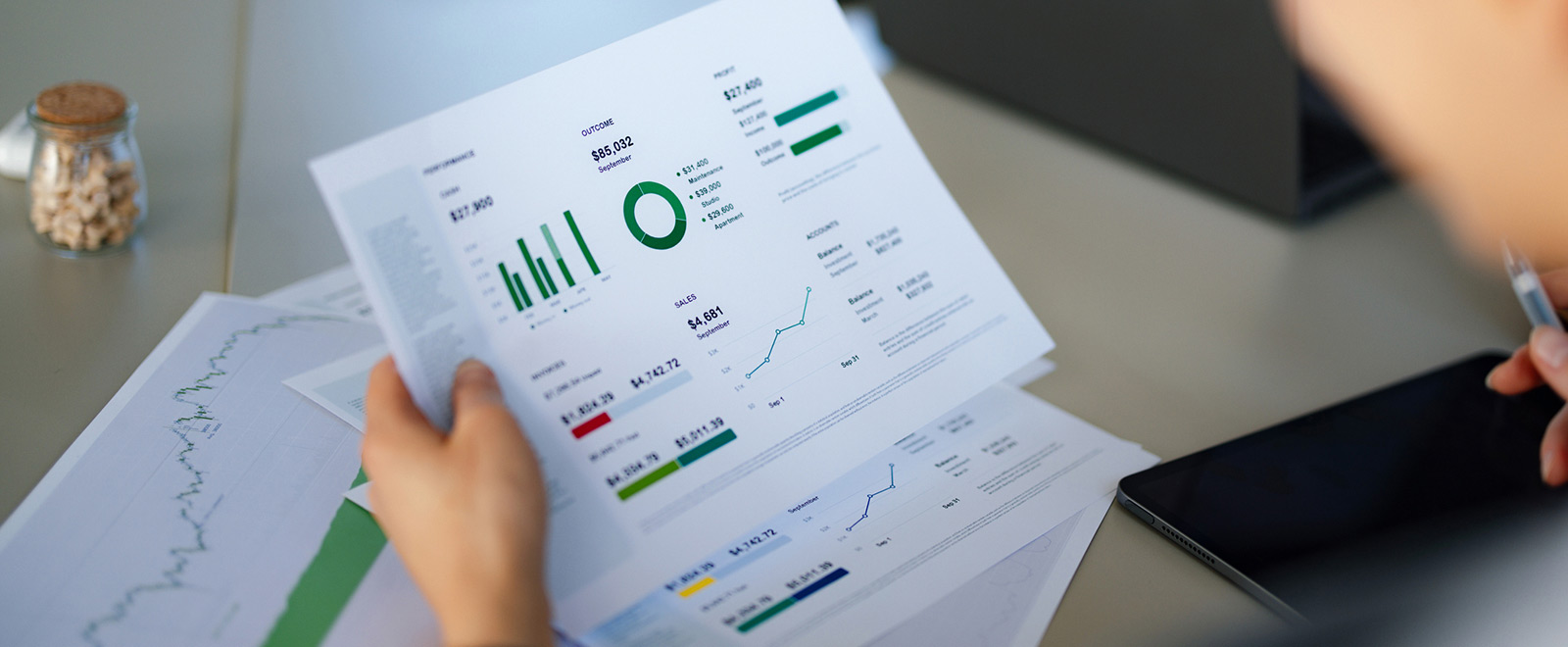 Business person analyzing graphs.